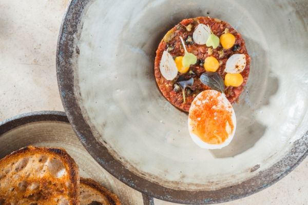 Beef Tartare with Tomato Jam and Pickled Wild Garlic Buds