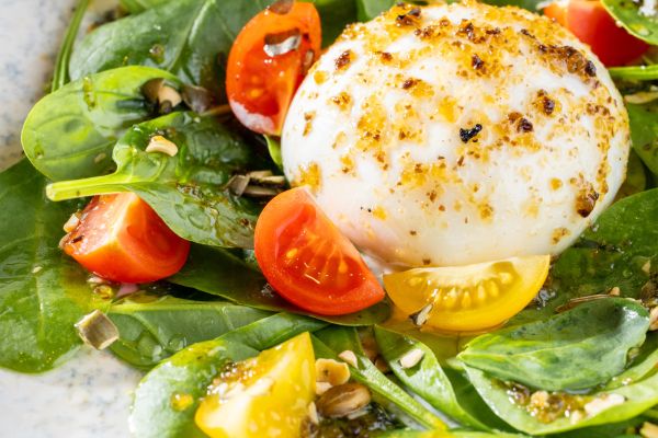 Burrata from Nógrád with Truffle Honey, Pumpkin Seeds and Baby Spinach